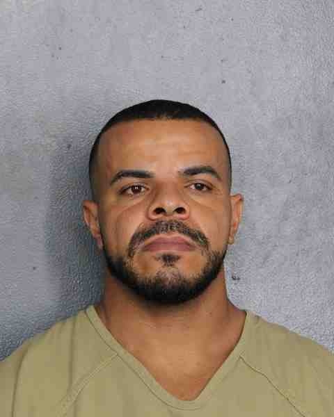 Booking photograph for SOUZA, YAGO