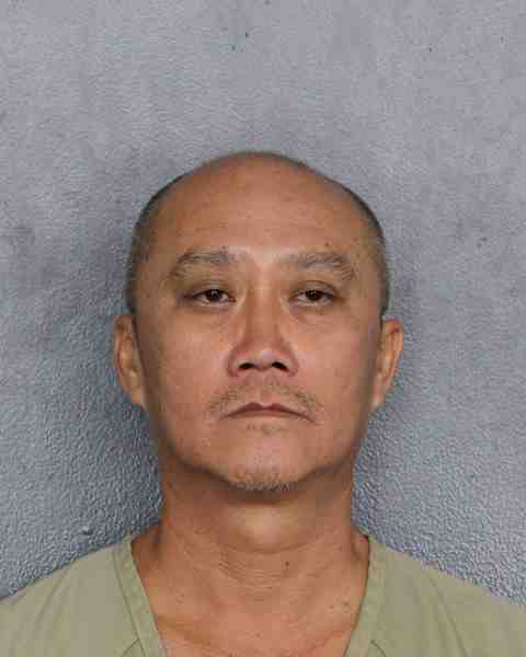 Booking photograph for HO, CUONG