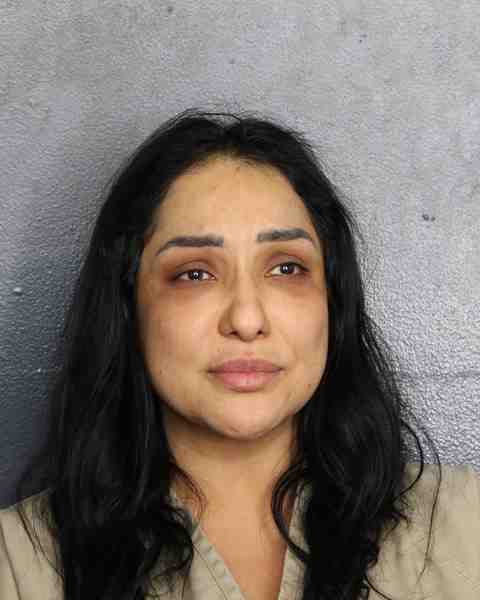 Booking photograph for MORA, CLAUDIA