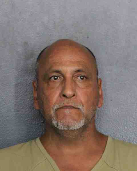 Booking photograph for FLORES, RAMON