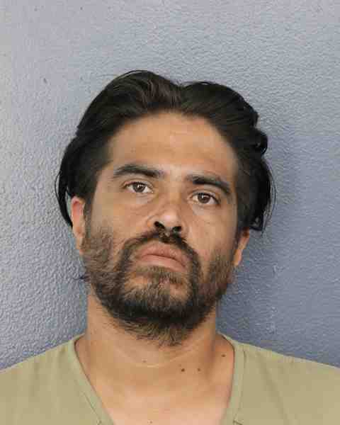 Booking photograph for EGUIGURE, CHRISTIAN