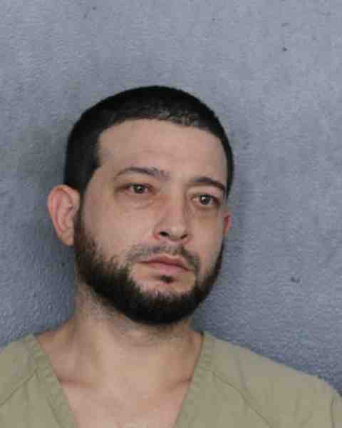 Booking photograph for MIRA, JOHN