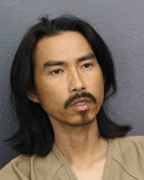Booking photograph for TRAN, HUAN
