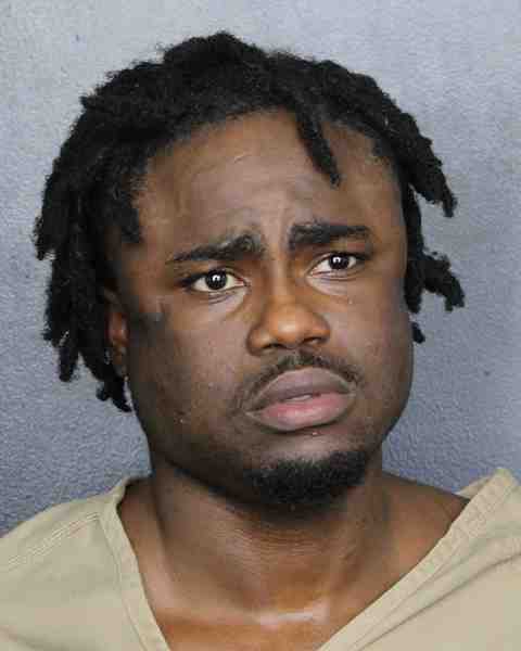 Booking photograph for TELUS, STEEVE